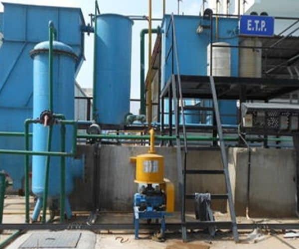 Industrial effluent treatment plant with dosing system, tanks and piping